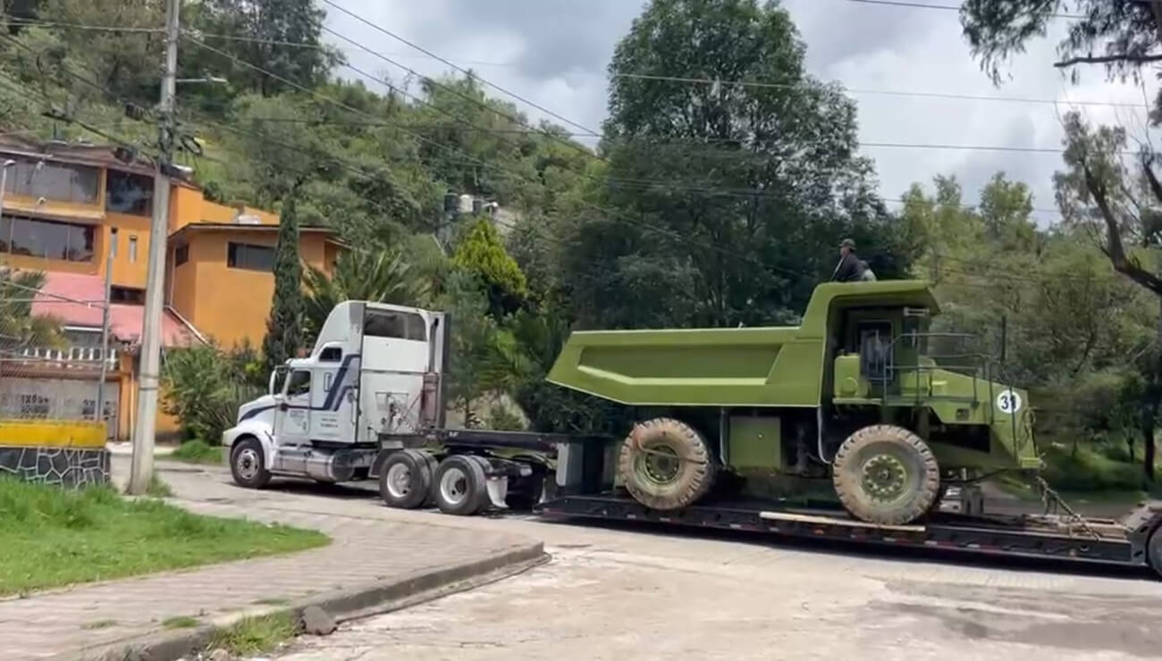 Transporting heavy green truck